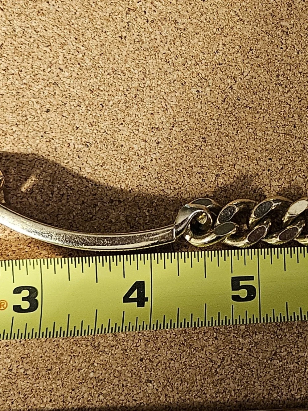 Vintage gold-tone curb-link ID bracelet signed SWANK on the Back identification
